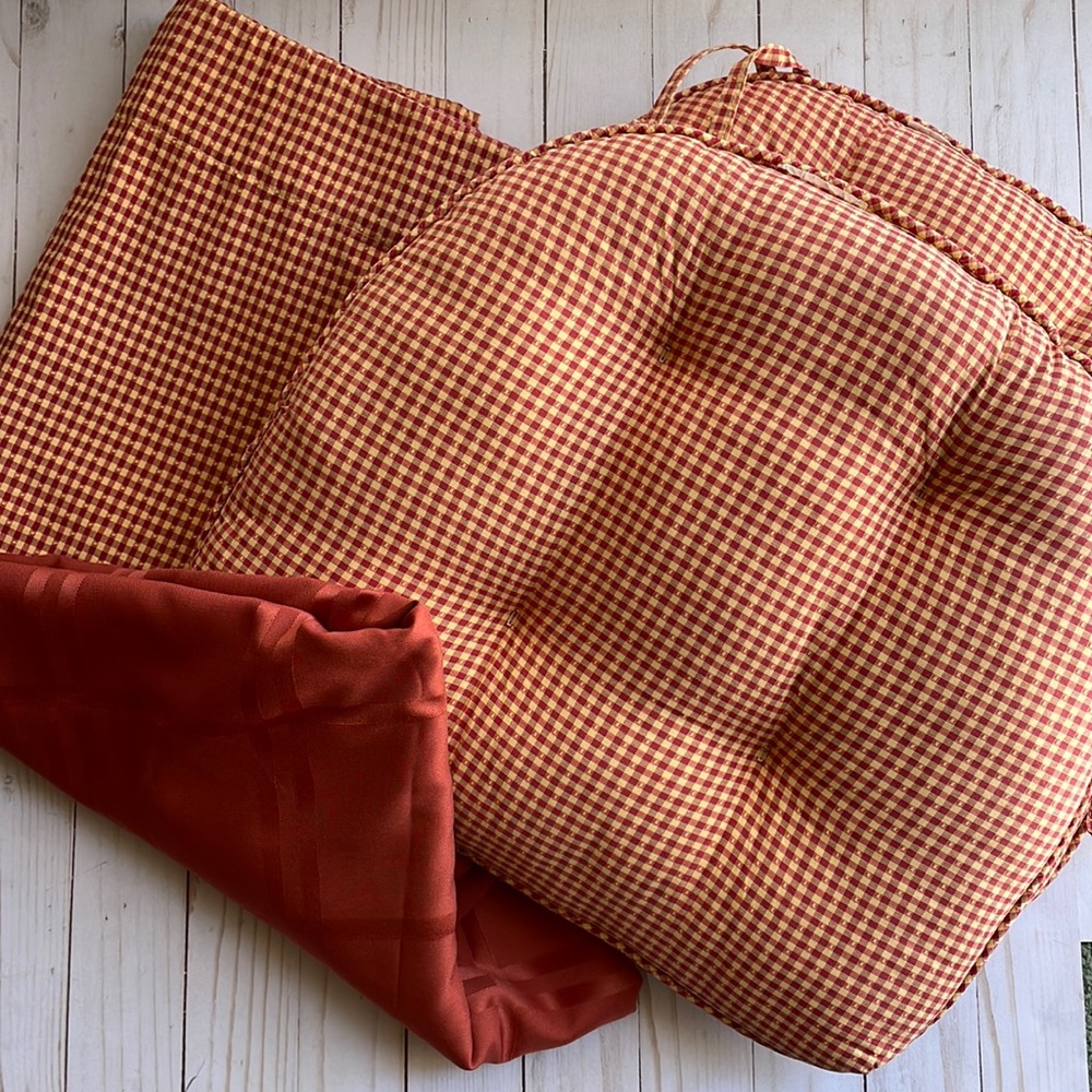 Two seat cushions, two window valances, and tablecloth. See measurements.